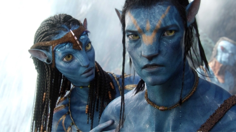 Neyteri (Zoe Saldana) and Jake Sully (Sam Worthington) in a scene from 'Avatar' / Photo credit: WETA & 20th Century Fox